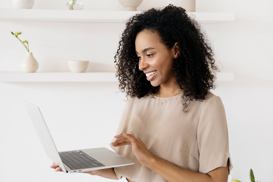 Free A Woman using a Laptop Stock Photo