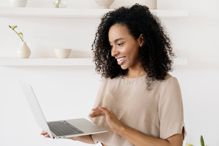 A Woman Using A Laptop