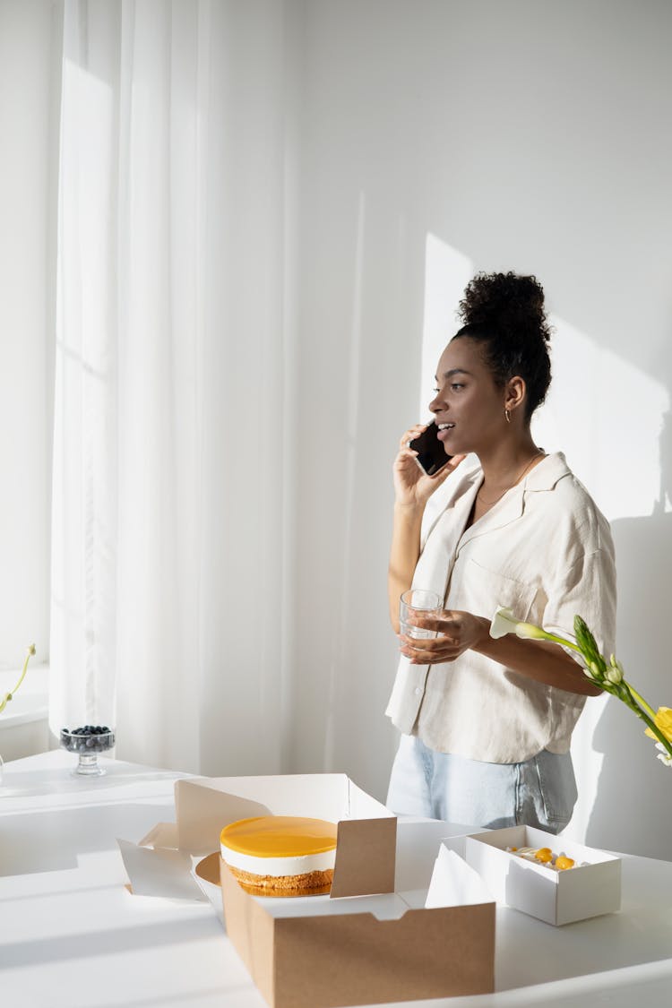 A Woman Talking On The Phone