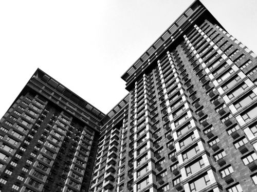 Free Dramatic low-angle view of a modern skyscraper in Kyiv, Ukraine, captured in striking monochrome. Stock Photo