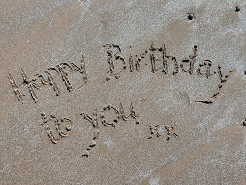 Kostenloses Stock Foto zu alles gute zum geburtstag, gruß, sand