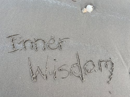 Free Inner Wisdom Written in the Sand Stock Photo