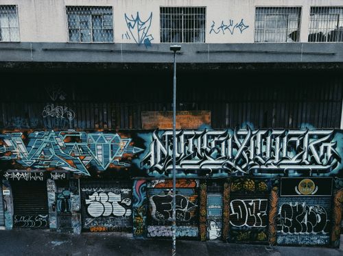 Free Vibrant street art and graffiti covering an urban building in Belo Horizonte. Stock Photo
