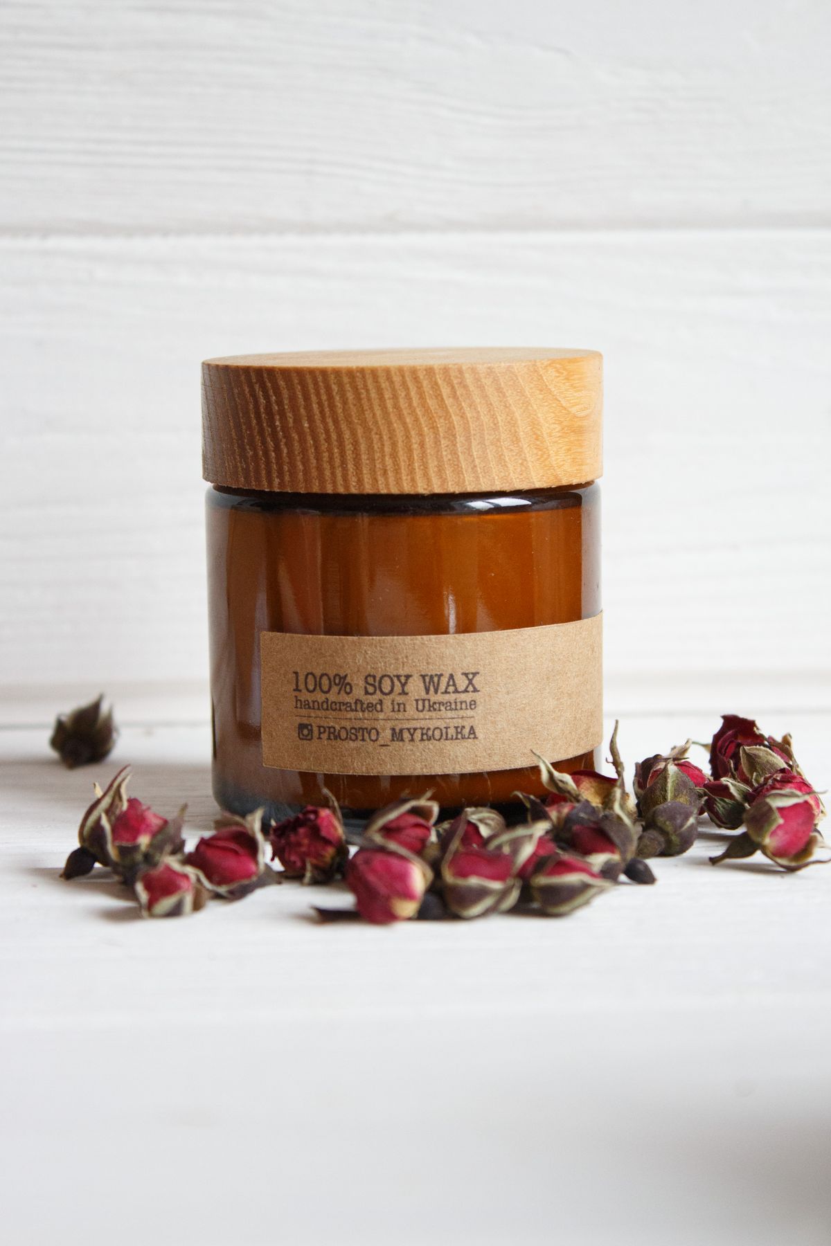 Close-up of a soy wax candle in a glass jar