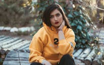Woman in Yellow Hoodie