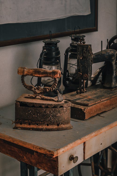 Free Old Rusty Iron on Black Sewing Machine Stock Photo