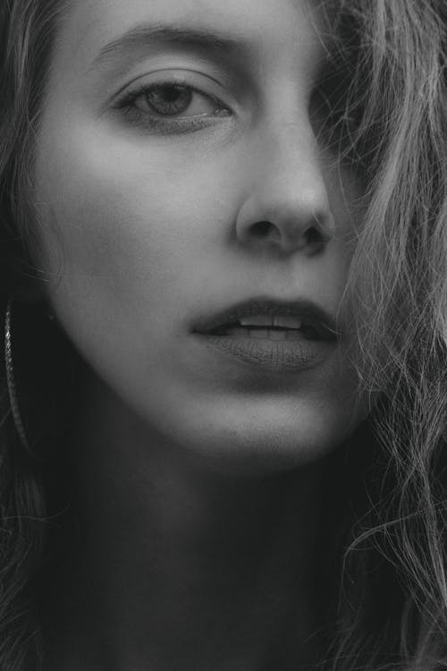 Woman's Face in Grayscale Photography