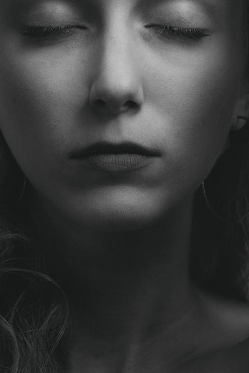 Black and White Photo of Woman's Face