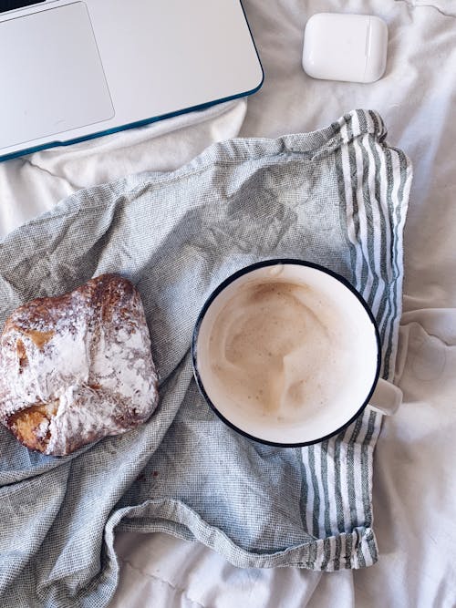 Free Ceramic Mug Beside a Bread Stock Photo