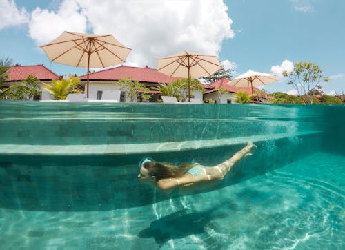 Woman Submerged in Swimming Pool