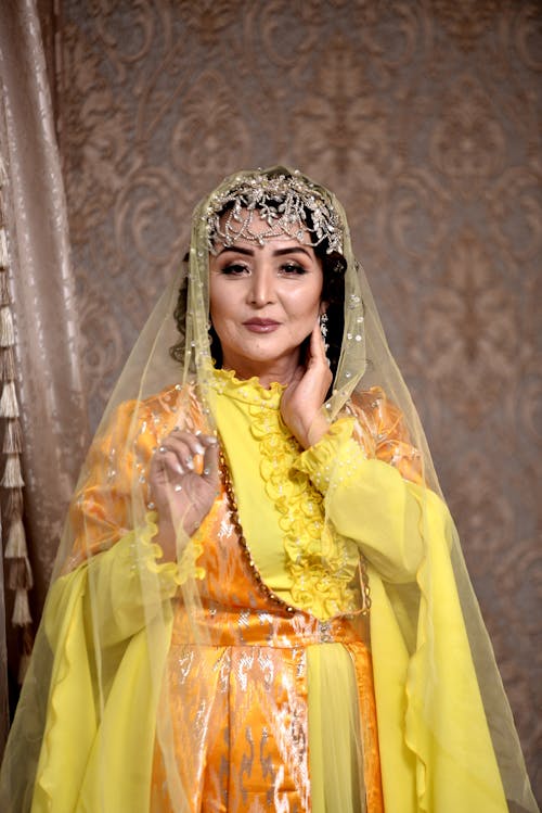 Middle Aged Woman in Yellow Traditional Wear