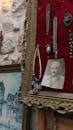 Photo of man and retro pendants on decorative frame