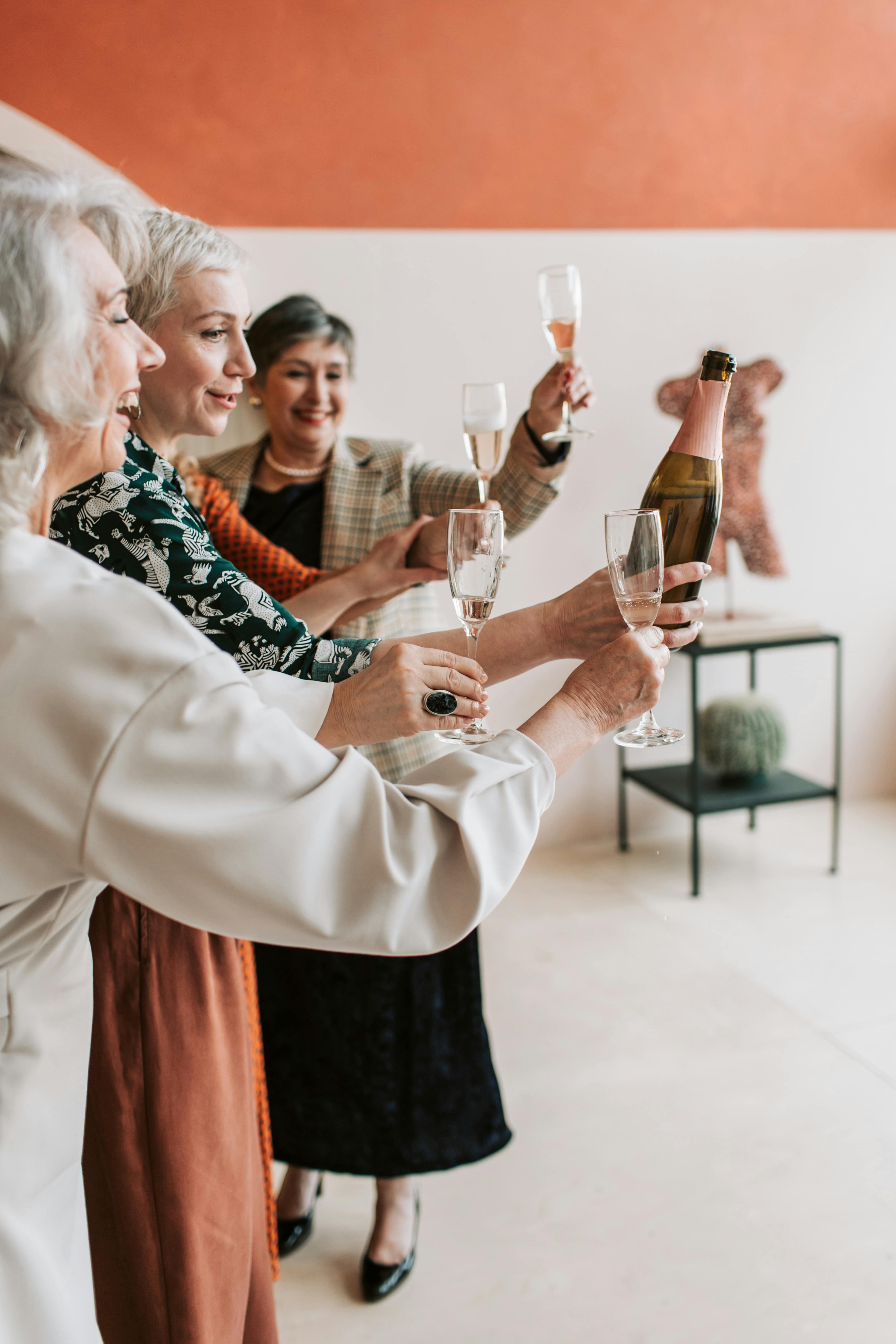 elderly women having a toast