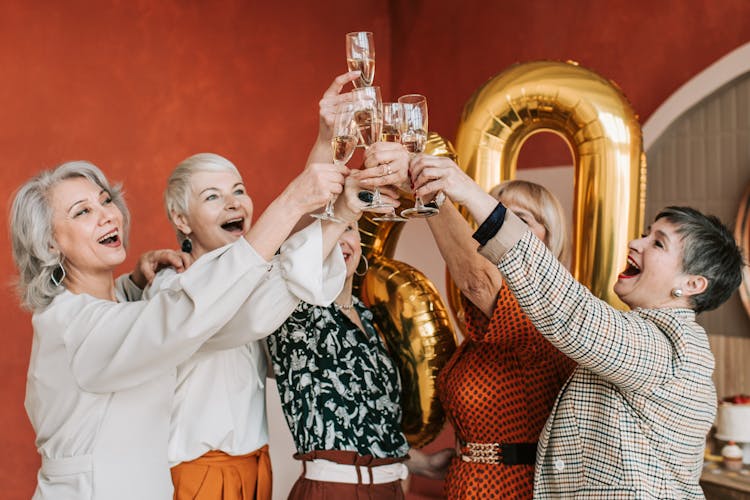 Elderly Women Having A Toast 