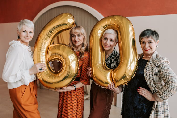 Group Of Elderly Women Celebrating Their Anniversary