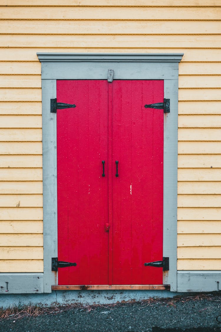 Red Door Of Yellow House