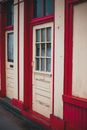 Old building with withered doors
