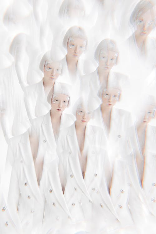 Multiplied Woman in White Suit