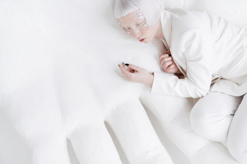 Woman in White Lying Down