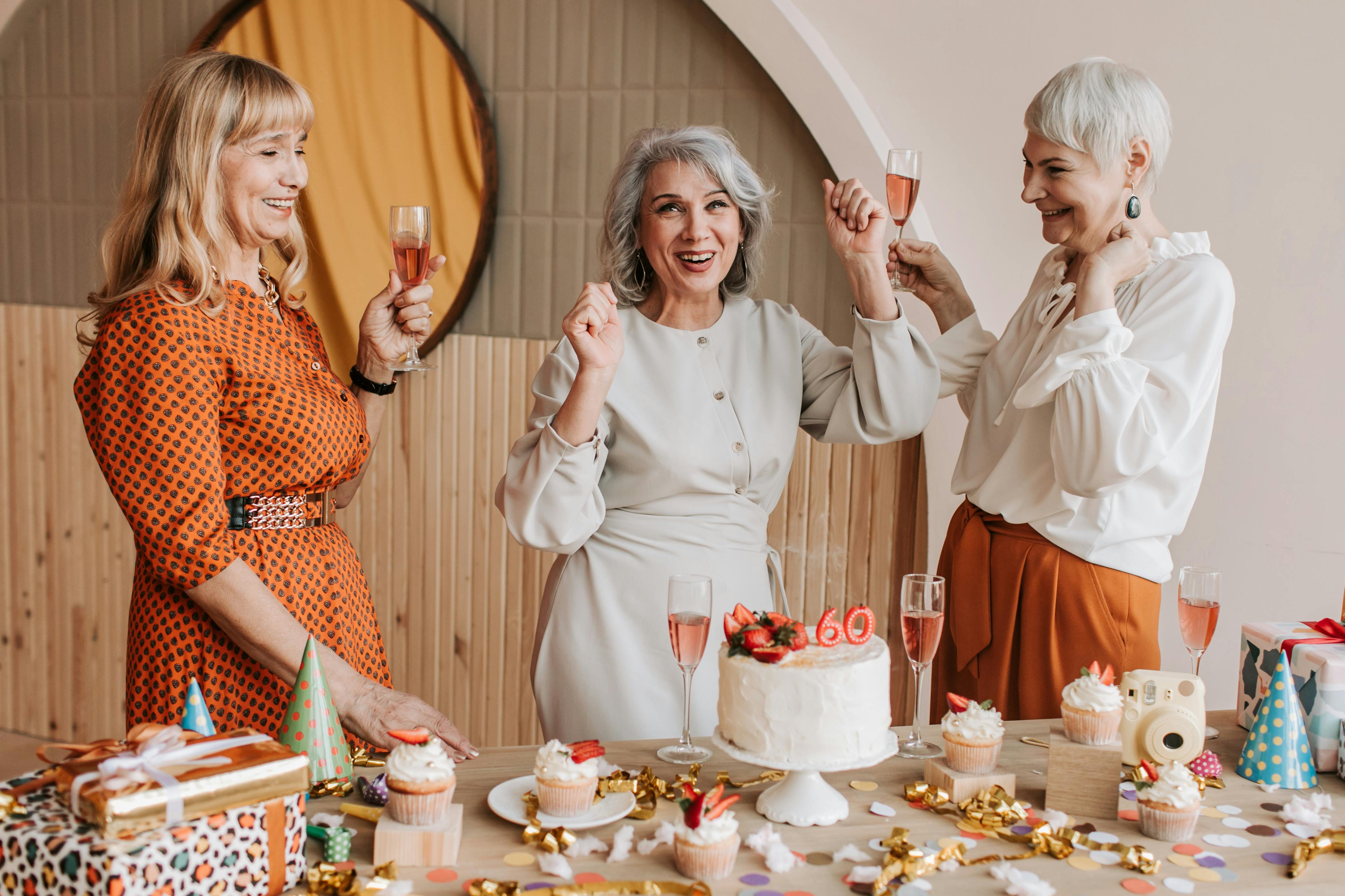 photo of elderly women dancing together