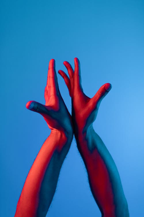 Free Persons Hand With Red Paint Stock Photo