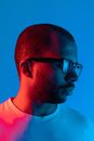Man in White Crew Neck Shirt Wearing Black Framed Eyeglasses