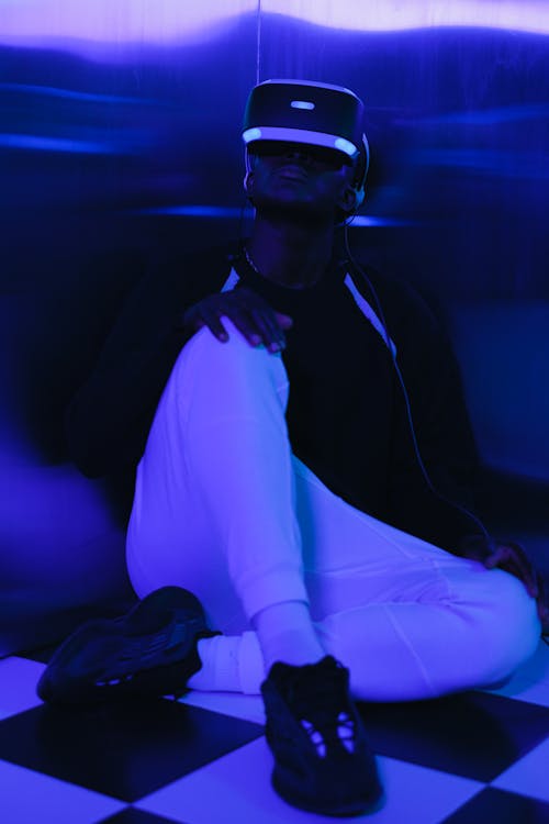 Man Playing a Virtual Reality Game with a VR Headset