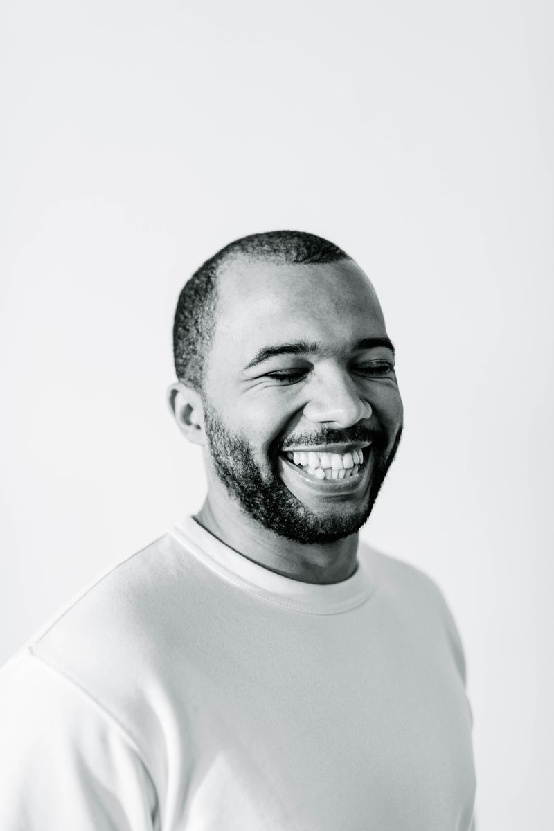 Portrait of a smiling man representing a Canada visit visa journey