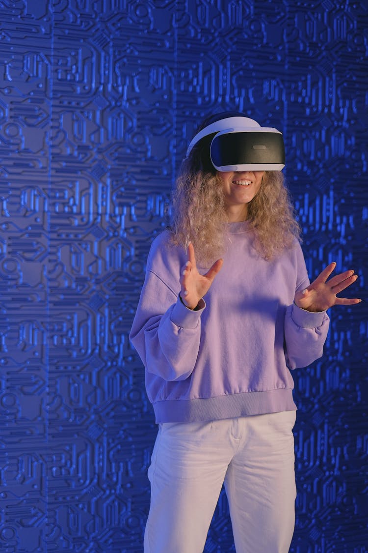 Woman In VR Glasses In Studio