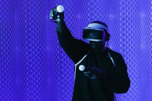 A man engaged in a virtual reality experience wearing VR goggles, holding controllers.