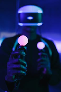 Man using illuminated VR headset and controllers in a modern setting.