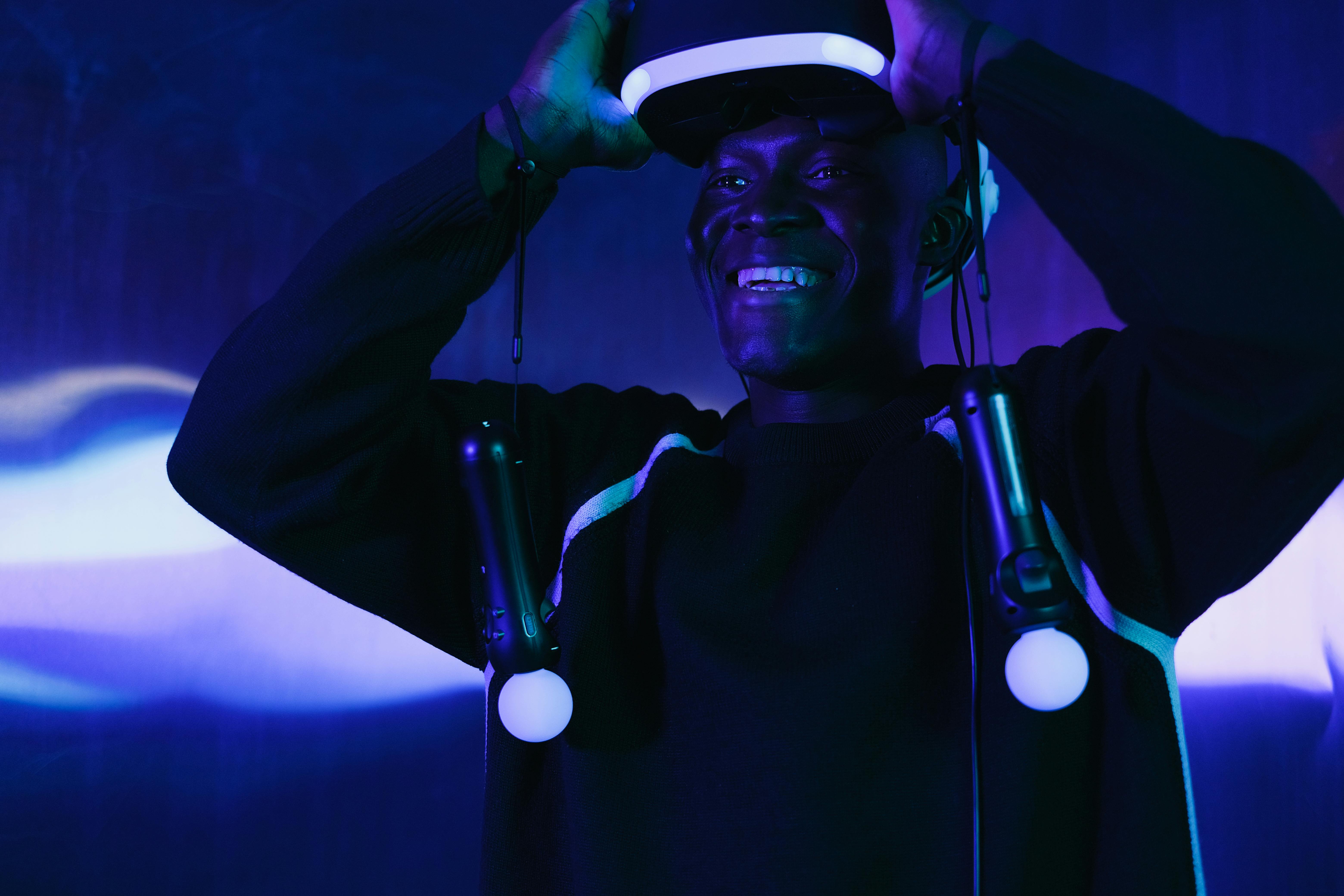 smiling man using virtual reality simulator