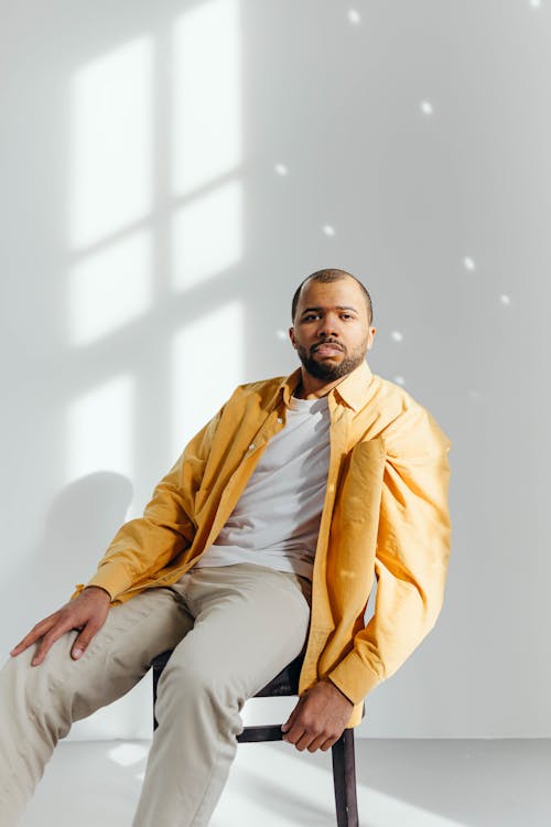 Bearded Man Sitting on a Chair