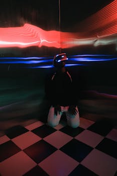 Person immersed in a virtual reality game with neon lights and checkerboard floor.