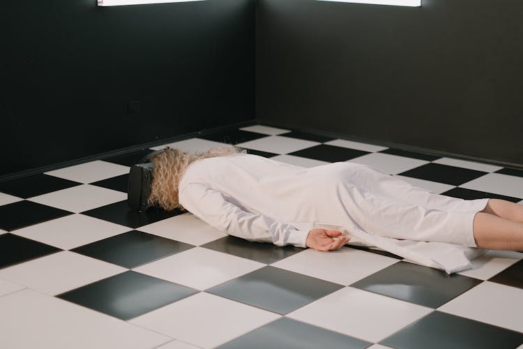 Woman Lying On The Floor