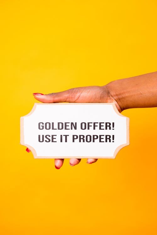 Free A Person Holding a Signage Stock Photo