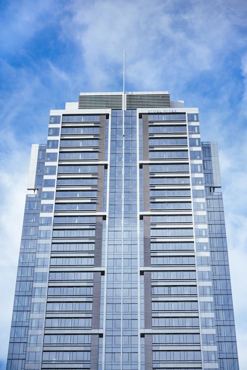 Modern multistory building on street · Free Stock Photo