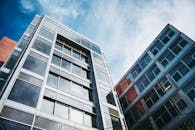 Exterior of residential buildings against blue sky