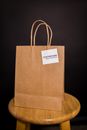 Brown Paper Bag with Written Quotes