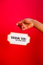 A Person Holding a Sign Board Thank You for Your Order