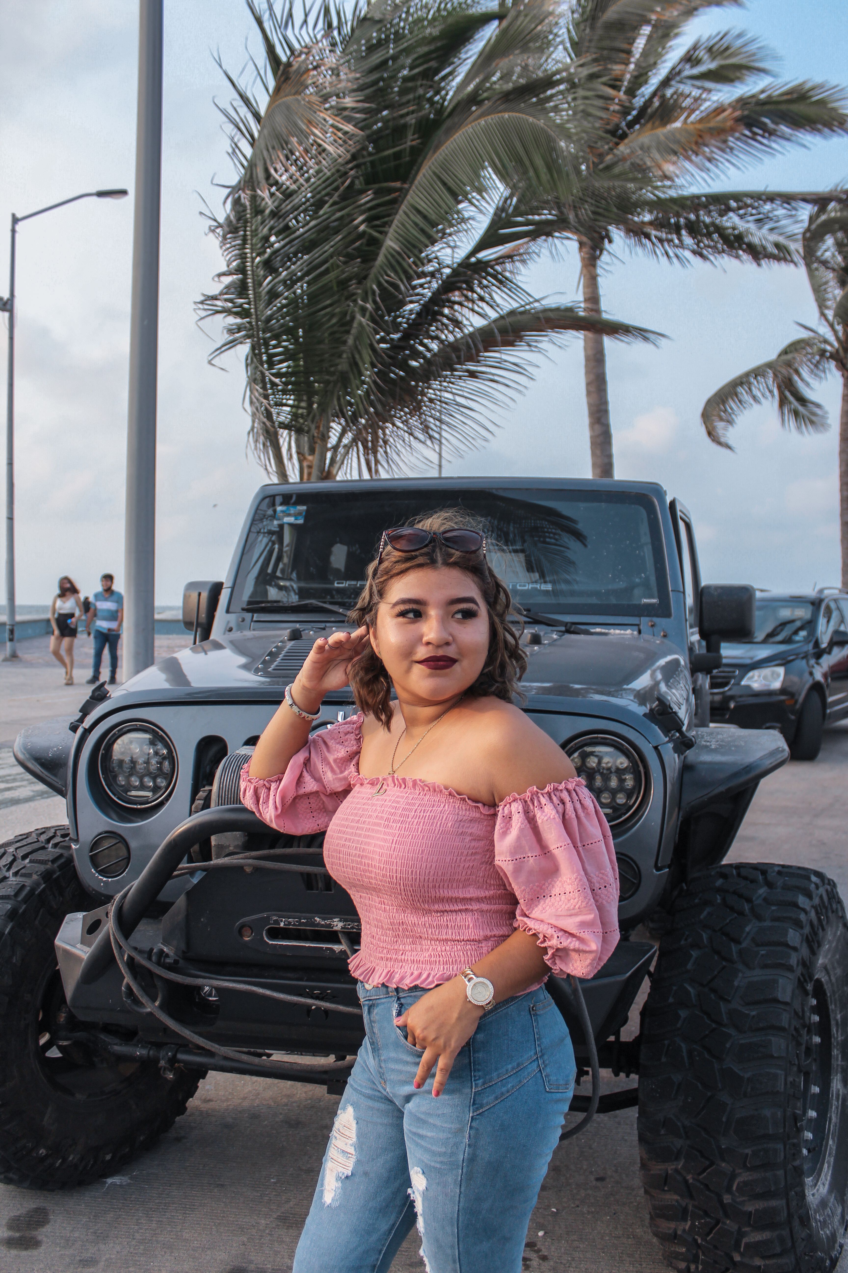 Woman Standing in front of a Vehicle · Free Stock Photo