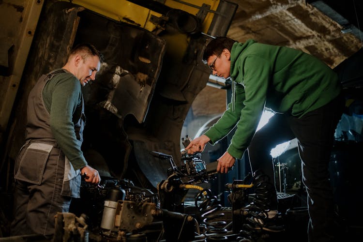 Mechanics Fixing An Engine