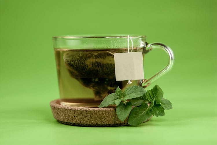 Transparent Cup Of Green Tea With Mint