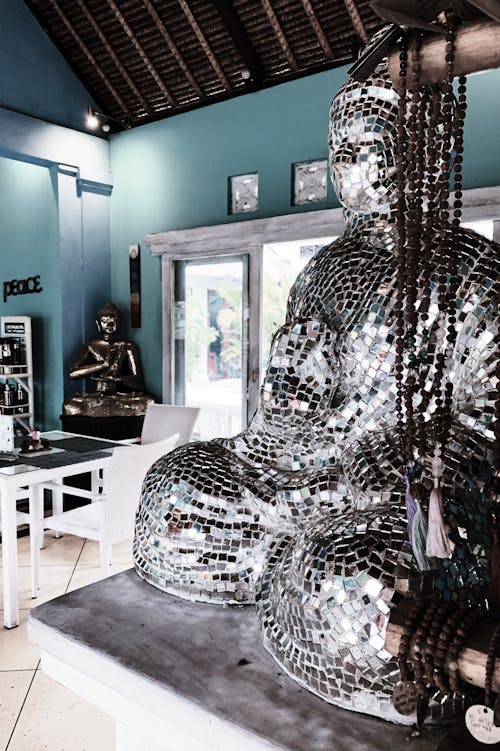 Modern Mirror Buddha Statue in Interior