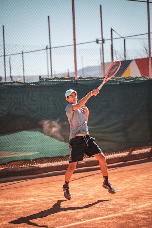 A Man Playing Tennis