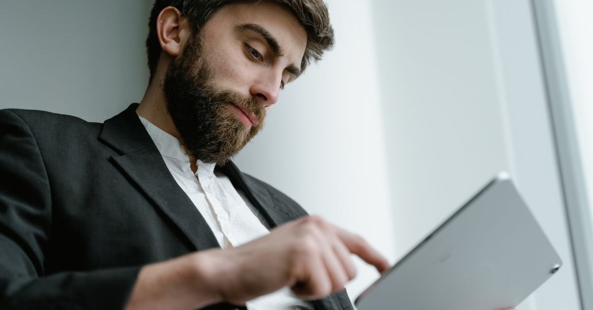 entrepreneur reviewing AI generated content on screen