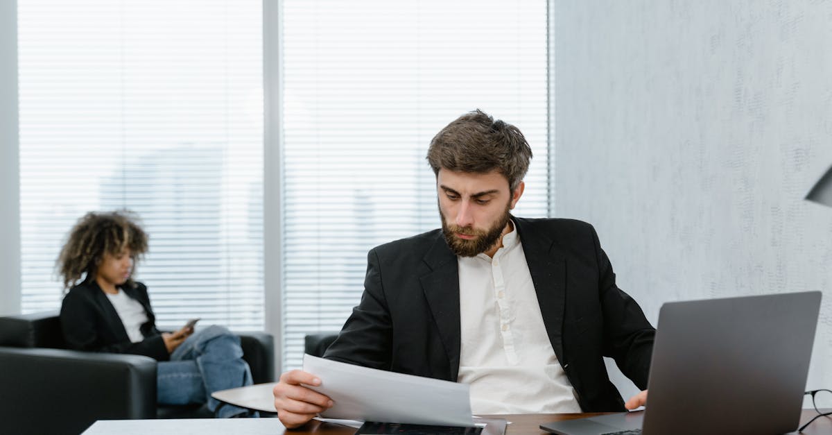 Office Worker Sending Email Status Report