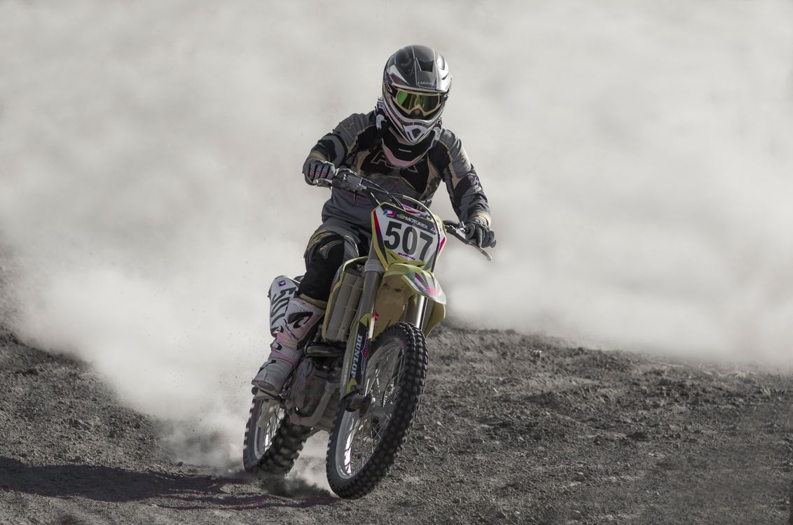 Human Riding A Roc Person Riding a Motorcycle · Free Stock Photo
