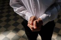 Man in White Dress Shirt and Black Pants