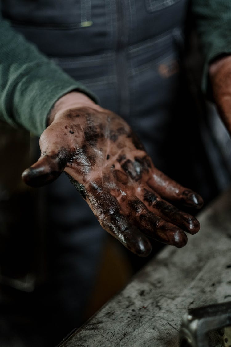 Hand With Black Grease